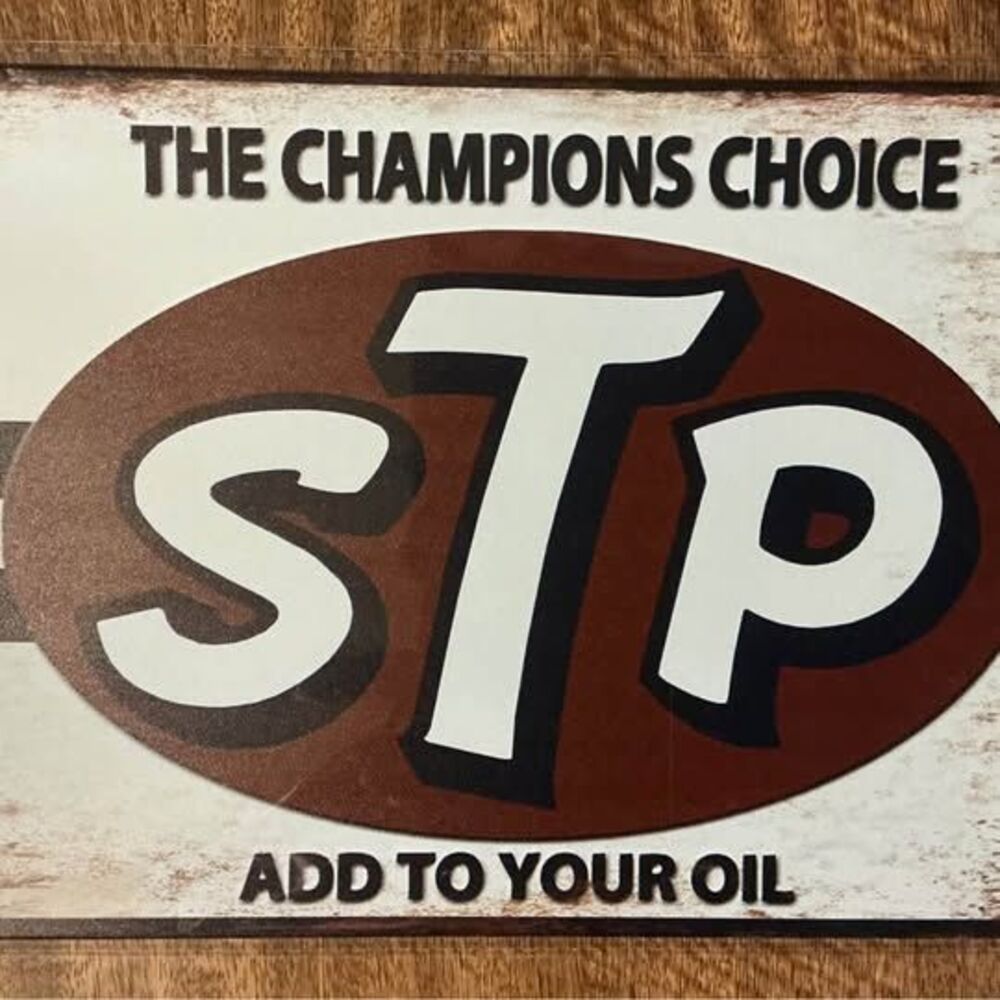 STP: The Champions Choice" Vintage Style Metal Sign